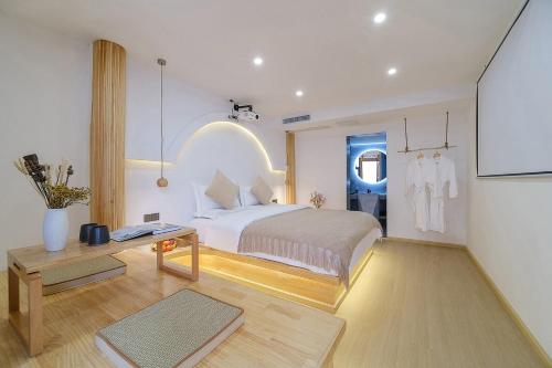 Imagen de la habitación del Big Tree Guesthouse - Naxi old style. Foto 18