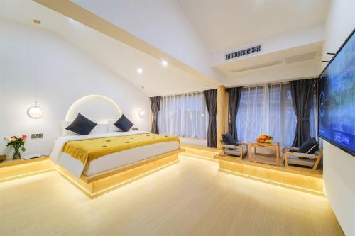 Imagen de la habitación del Big Tree Guesthouse - Naxi old style. Foto 19
