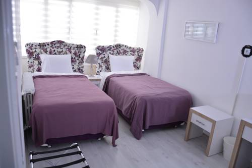 Imagen de la habitación del Bilge Suite Hotel. Foto 4