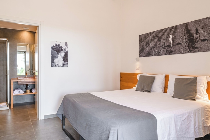 Imagen de la habitación del Bio Agriturismo Corte degli Ulivi. Foto 4
