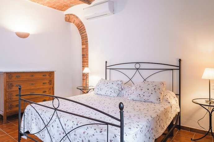 Imagen de la habitación del Bio Agriturismo Corte degli Ulivi. Foto 6