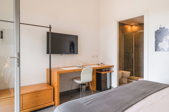 Imagen de la habitación del Bio Agriturismo Corte degli Ulivi. Foto 7