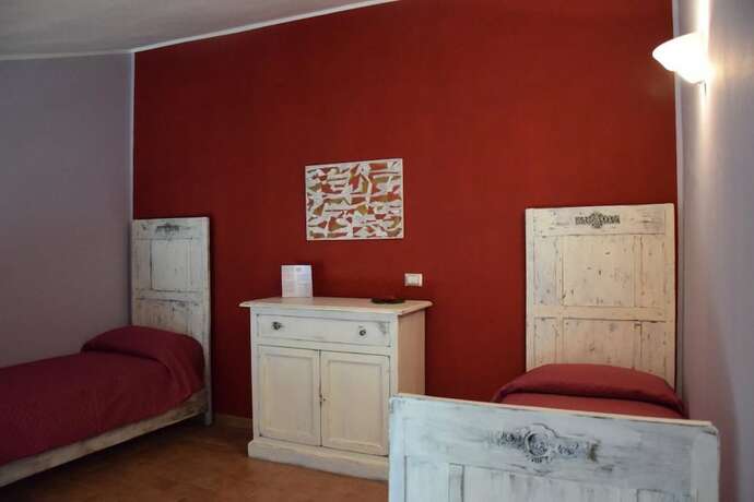 Imagen de la habitación del Bio Agriturismo Valle dei Calanchi. Foto 19