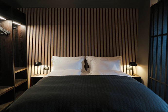 Imagen de la habitación del Black Beach Suites. Foto 5