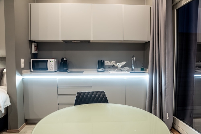 Imagen de la habitación del Black Beach Suites. Foto 7