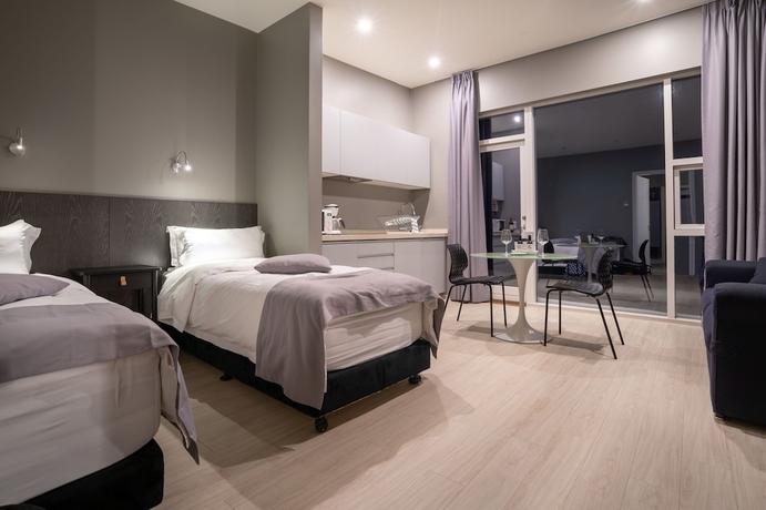 Imagen de la habitación del Black Beach Suites. Foto 8