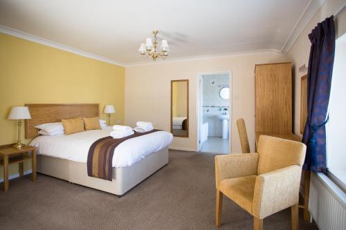 Imagen de la habitación del Blakeney Manor Hotel. Foto 10