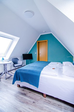 Imagen de la habitación del Blischkes Hotel. Foto 17