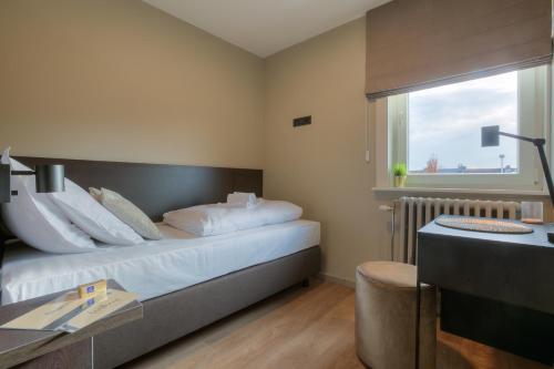 Imagen de la habitación del Bloomhotel. Foto 6