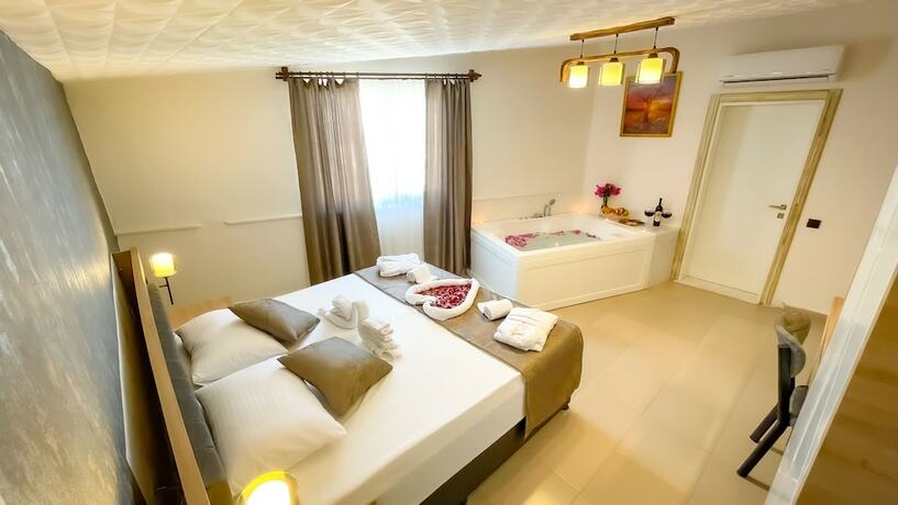 Imagen de la habitación del Bloomtalya Hotel. Foto 14