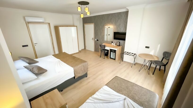 Imagen de la habitación del Bloomtalya Hotel. Foto 15