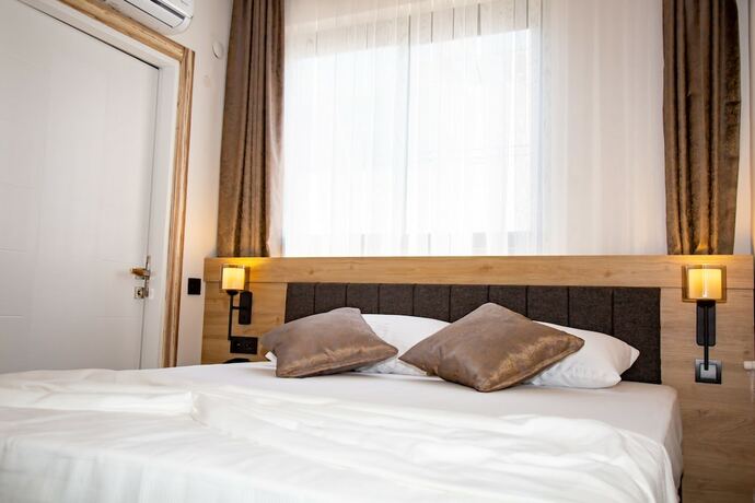 Imagen de la habitación del Bloomtalya Hotel. Foto 16