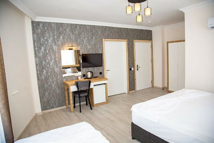 Imagen de la habitación del Bloomtalya Hotel. Foto 19