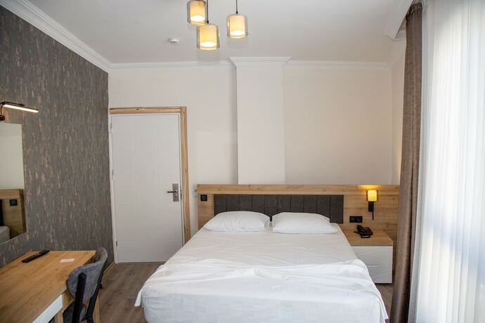 Imagen de la habitación del Bloomtalya Hotel. Foto 20
