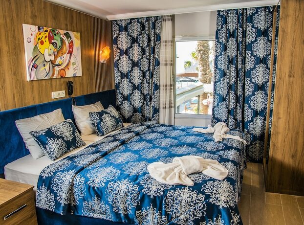 Imagen de la habitación del Blue Bay Beach Otel. Foto 19