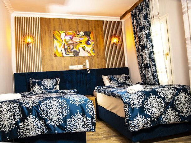 Imagen de la habitación del Blue Bay Beach Otel. Foto 20