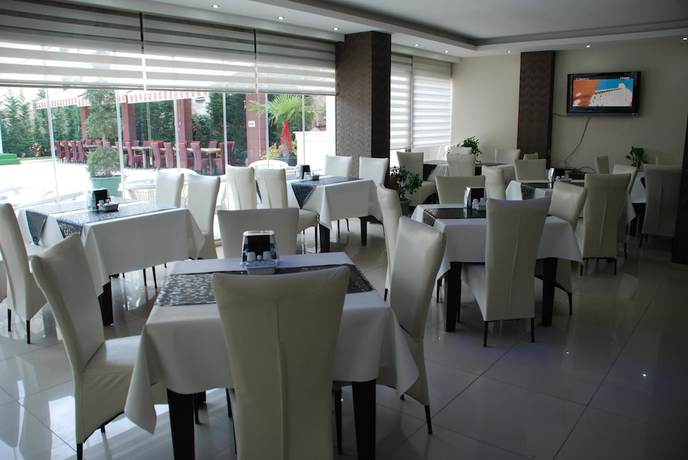 Imagen del bar/restaurante del Blue Dolphin Hotel. Foto 3