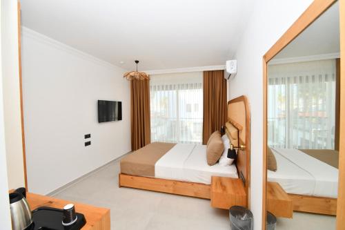 Imagen de la habitación del Blue Point Hotel Yalikavak. Foto 14