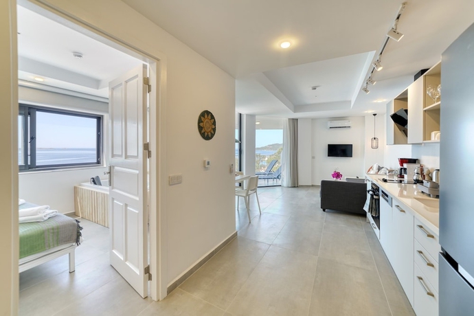 Imagen de la habitación del BlueNook Suites. Foto 5