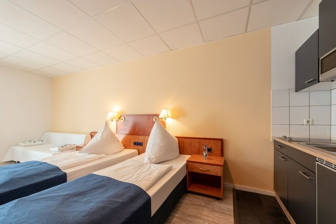 Imagen de la habitación del Boardinghouse Burgpark. Foto 20