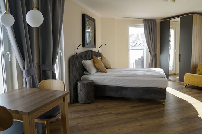 Imagen de la habitación del Boardinghouse City Home. Foto 2