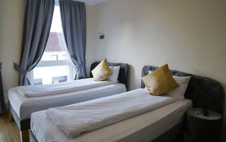 Imagen de la habitación del Boardinghouse City Home. Foto 4