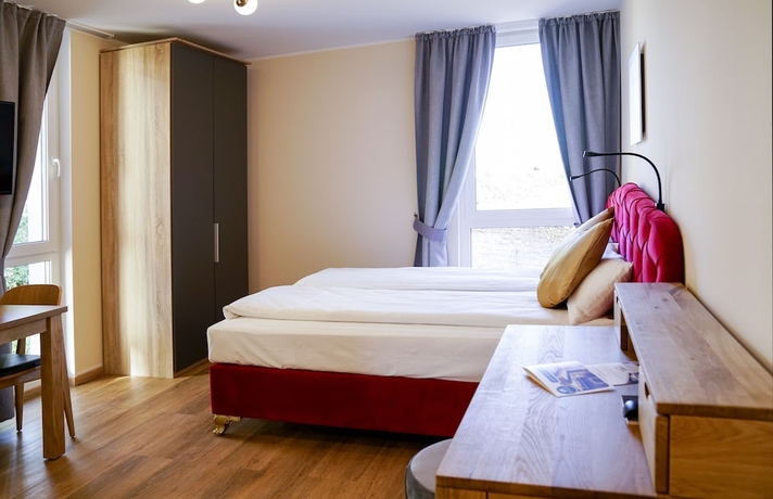 Imagen de la habitación del Boardinghouse City Home. Foto 13