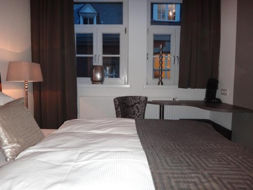 Imagen de la habitación del Boardinghouse Haus Am H&uuml;hnerdieb. Foto 9