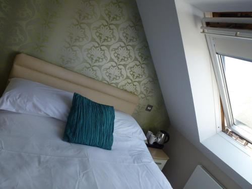 Imagen de la habitación del Boathouse Hotel. Foto 5