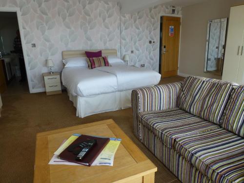 Imagen de la habitación del Boathouse Hotel. Foto 6