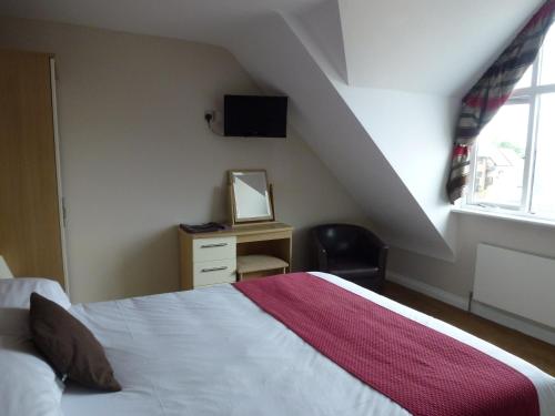 Imagen de la habitación del Boathouse Hotel. Foto 8
