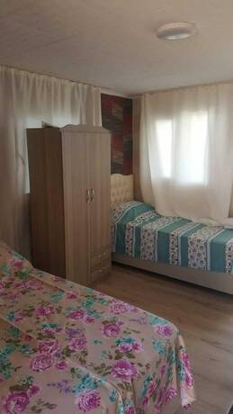 Imagen de la habitación del Bobus Restaurant and Bungalow. Foto 16