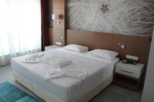 Imagen de la habitación del Bodrum Gulluk Marina Suites. Foto 4