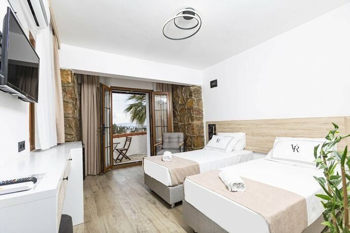 Imagen de la habitación del Bodrum Vera Hotel. Foto 11