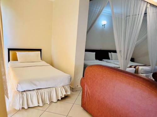 Imagen de la habitación del Bomah Hotel Limited. Foto 17