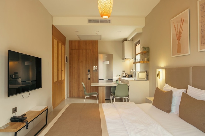 Imagen de la habitación del Bomo Suites. Foto 4
