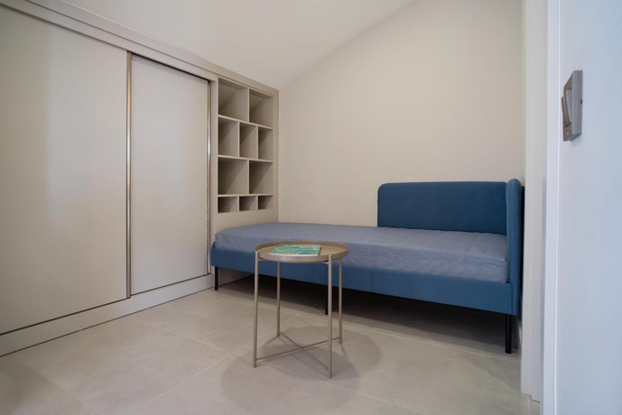 Imagen de la habitación del Bomo Suites. Foto 10