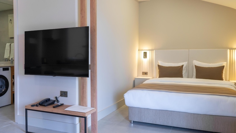 Imagen de la habitación del Bomo Suites. Foto 11