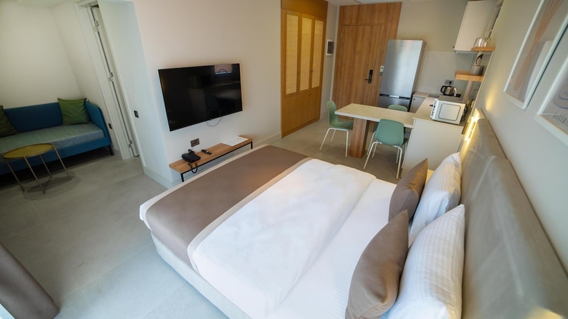 Imagen de la habitación del Bomo Suites. Foto 12