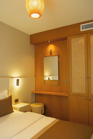 Imagen de la habitación del Bomo Suites. Foto 13