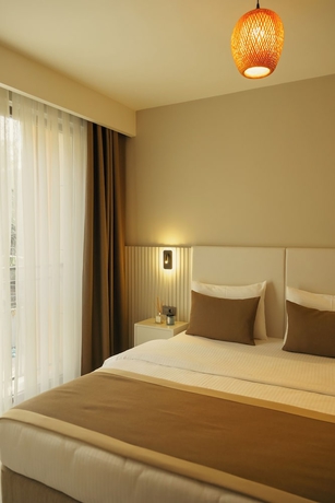 Imagen de la habitación del Bomo Suites. Foto 14