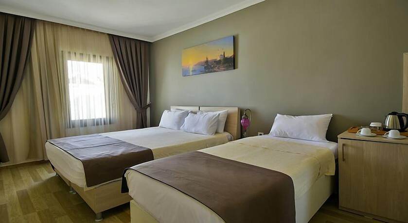 Imagen de la habitación del Bon Hotel City And Resort. Foto 3