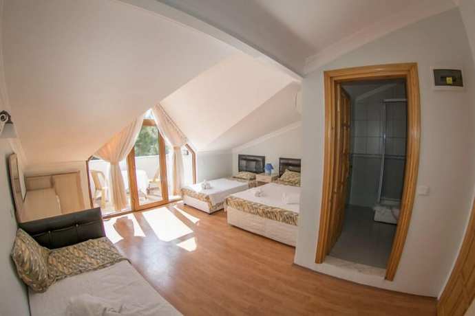Imagen de la habitación del Boncuklu Otel. Foto 11