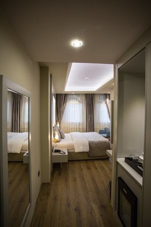 Imagen de la habitación del Bonne Sante Hotel. Foto 2