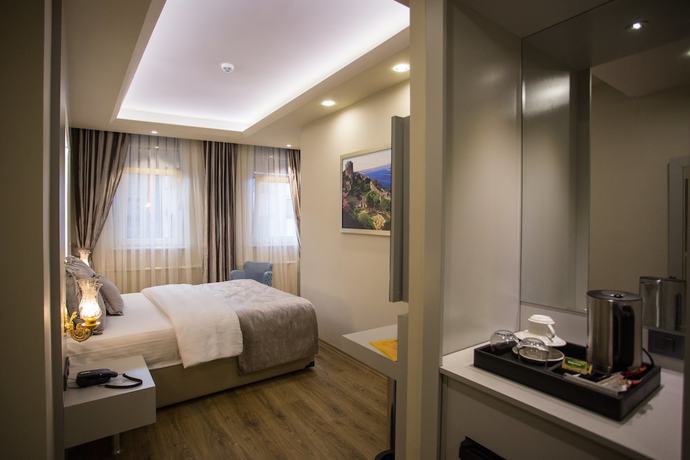 Imagen de la habitación del Bonne Sante Hotel. Foto 14