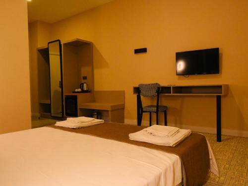 Imagen de la habitación del Bonnie City Hotel. Foto 15