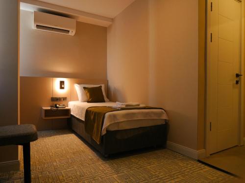 Imagen de la habitación del Bonnie City Hotel. Foto 16