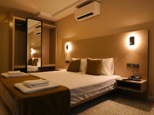 Imagen de la habitación del Bonnie City Hotel. Foto 18