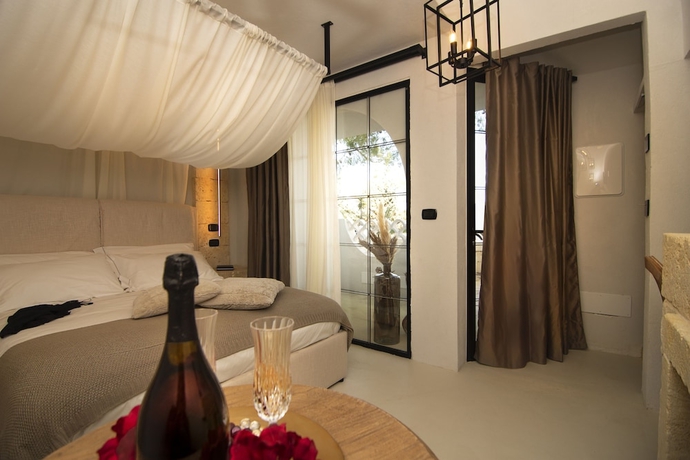 Imagen de la habitación del Borgo Bevagna Relais. Foto 5