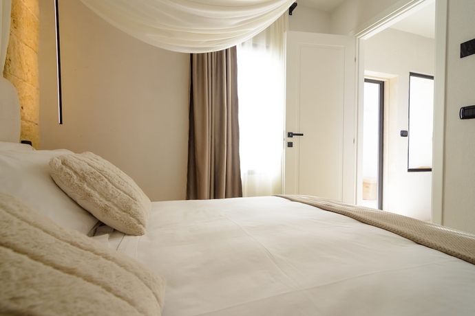 Imagen de la habitación del Borgo Bevagna Relais. Foto 6